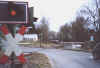 Zug nach Marienheide passiert den BÜ am ehem. Hp. Gummersbach-Nord, Blick in Richtung Süden (13.3.2004), (c) Alex M.