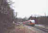 Zug nach Köln-Hansaring passiert den Abspannmast beim BÜ am ehem. Hp. Gummersbach-Nord, Blick in Richtung Süd-West (15.3.2004), (c) Alex M.